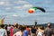 Parachutist in the blue sky