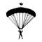 Parachutist in flight vector silhouette illustration isolated on white background