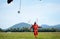 A parachutist jumps at the moment of landing shot