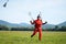 A parachutist jumps at the moment of landing shot