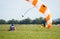 A parachutist shortly after the moment of landing shot