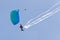 Parachutists demonstrate jumping from airplane