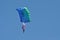 Parachutists flying in the air