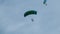 Parachutists in Tandem Flying in the Sky with a Parachute. Slow Motion