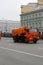 After the Parade, orange KAMAZ trucks in soccer balls clean the street. The inscription on the Board is