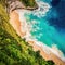 Paradise beach viewed from high above. Blue turquoise water and white sand beach at the bottom of a cliff. Beautiful colors.