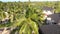 Paradise Coast Resort with Palm Trees and Hotels by Ocean, Zanzibar, Aerial view