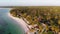 Paradise Coast Resort with Palm Trees and Hotels by Ocean, Zanzibar, Aerial view