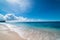 Paradise empty beach on a Tropical island. Azure sea sandy beach and blue sky