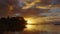 Paradise rocky tropical island at sunset time lapse. Boats on the beach and Le Morne Brabant at sunset time. Mauritius.