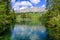 Paradise scenery at Karersee Lago di Carezza, Carezza lake in Dolomites of Italy at Mount Latemar, Bolzano province, South tyrol