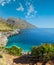 Paradise sea bay with azure water and beach view from coastline trail of Zingaro Nature Reserve Park, between San Vito lo Capo and