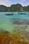 Paradise tropical stone sea bay with boats