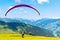 Paraglide launching. Starting procedure of paraglider on high mountain meadow. Recreational and competitive adventure