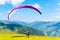 Paraglide launching. Starting procedure of paraglider on high mountain meadow. Recreational and competitive adventure