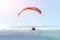 paraglide with a motor high in the sky