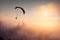 Paraglide silhouette over free ukrainian Carpathians