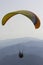 Paraglider above alpine mountains