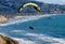 Paraglider above Pacific ocean with Scripps Institution of Oceanography Pier in background, La Jolla, CA.