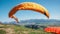 Paraglider catch a wind with his paraplane