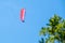 Paraglider flies in the air -Aerial view of paraglider.