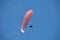 Paraglider flies in the air -Aerial view of paraglider.