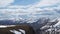 Paraglider flies among the mountains of the Caucasus