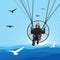 Paraglider flight with birds