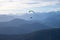 paraglider floating above bavarian alps