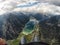 Paraglider flying over mountains