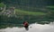 Paraglider flying over Voss, Norway