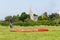 Paraglider in front of a church