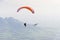 Paraglider and glider flying high