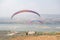 Paraglider on the ground. Paragliding flying over Landscape from Beautiful View Mekong River at Wat Pha Tak Suea in Nongkhai,