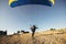 Paraglider on the ground  prepairs to fly