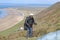 Paraglider launching at Rhossili