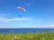 Paraglider near cliff along baltic sea coastline