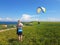Paraglider near cliff along baltic sea coastline