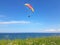 Paraglider near cliff along baltic sea coastline