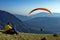 Paraglider over the Ciucas Mountains, landmark attraction in Romania