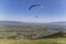 Paraglider in the popular area for parachuting on the side of Korylovos in Drama