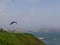 Paraglider is preparing to jump and fly, coast of Lima