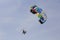 Paraglider with a saddle for people. Parasales - water parachutes. Bright colours