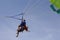 Paraglider with a saddle for people. Parasales - water parachutes. Bright colours