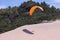 Paraglider sail down the dunes  of Cape Kiwanda State Natural Area