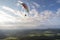 Paraglider in the sky over wasserkuppe mountain in germany