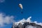 A paraglider in Swiss alpine mountain