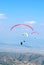 Paragliders on a background of blue sky