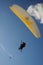 Paragliders in the blue sky