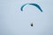 Paragliders fly along the steep coast of the Baltic Sea
